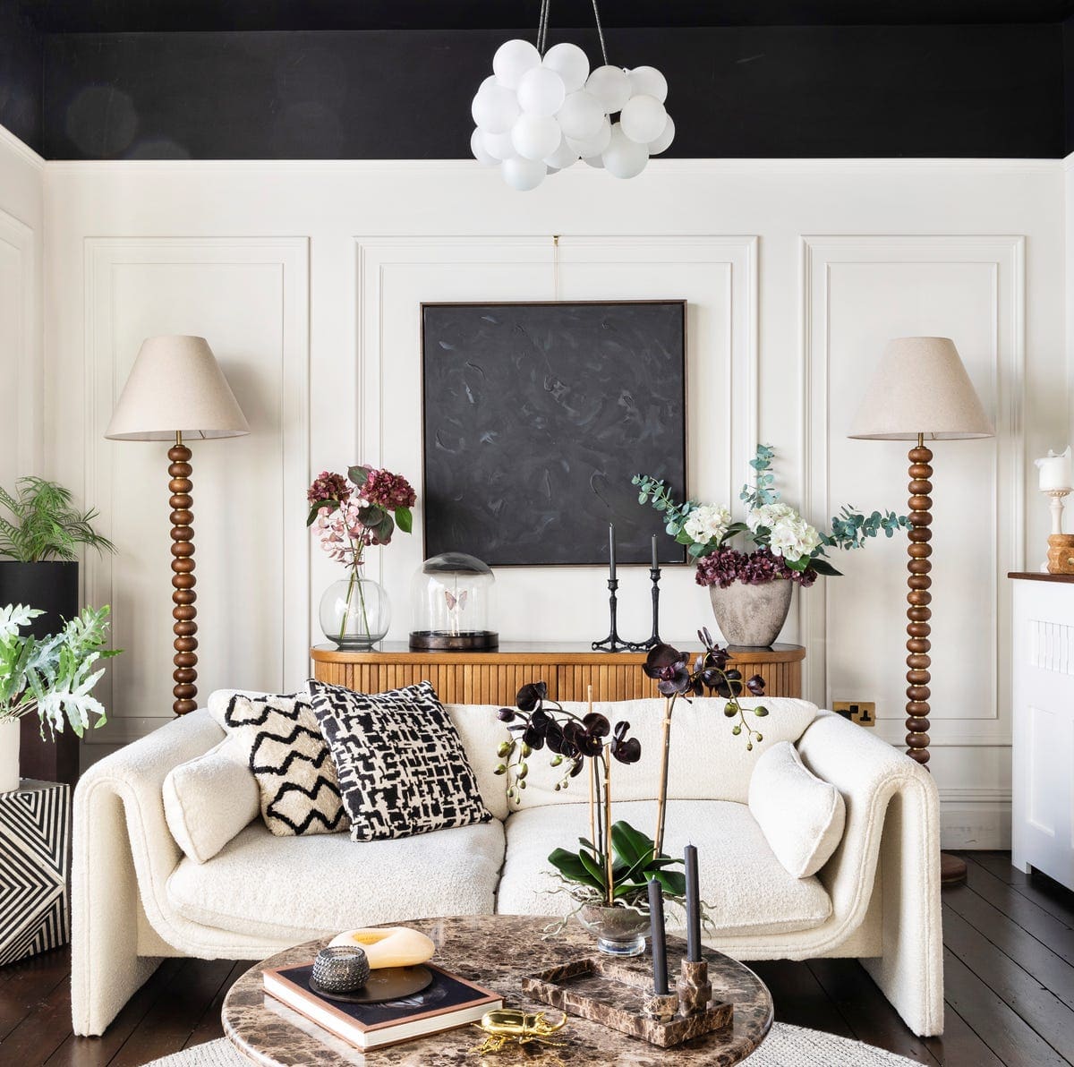 Panelled living room refurbishment with feature fireplace